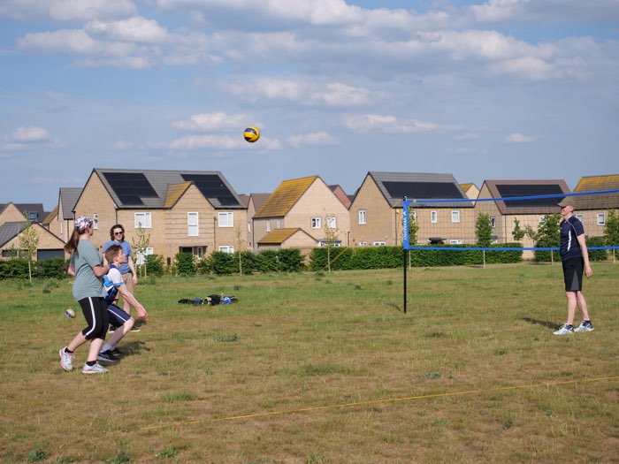 A game underway with Northstowe houses in the background