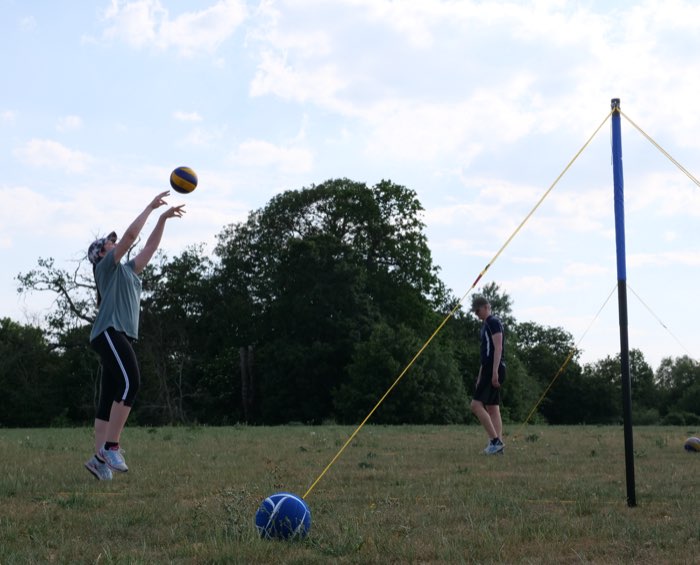 A player jumping to serve the ball